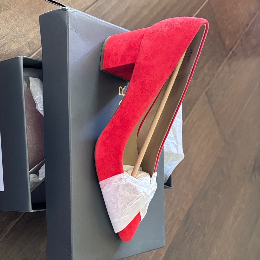 Red women’s suede pumps